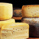 Wheels and wedges of cheese